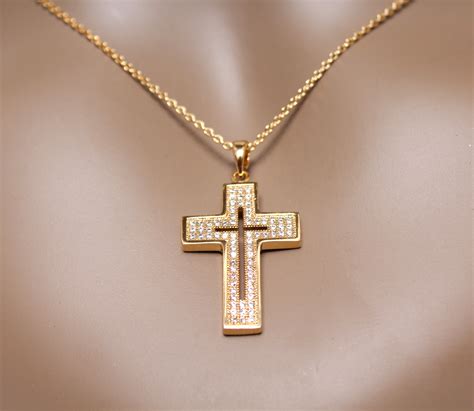 gucci gold cross necklace.